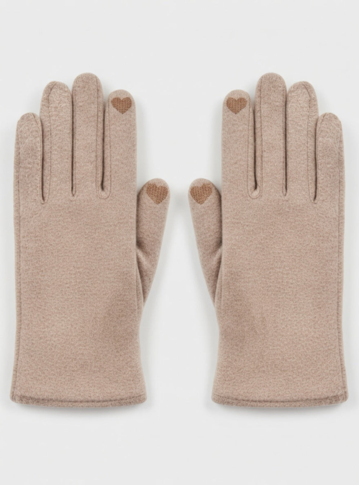 Pair of beige gloves with heart-shaped dots on a white background