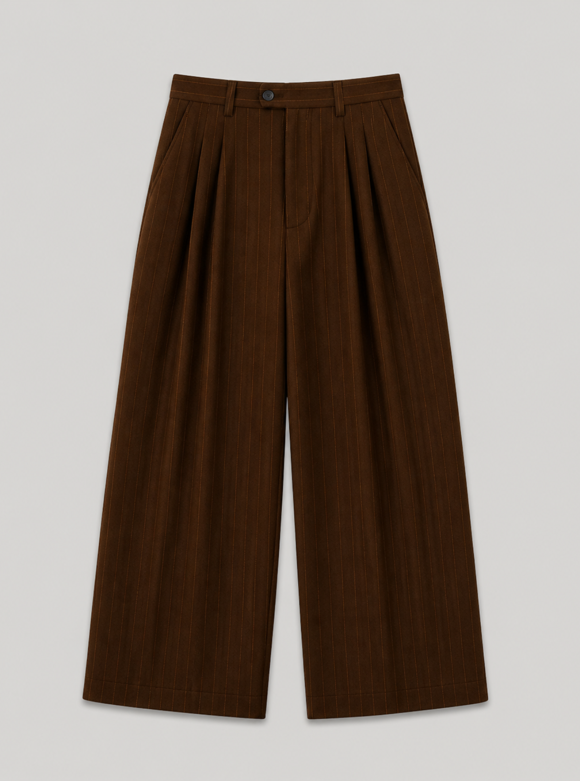 Brown pleated pants on a light gray background