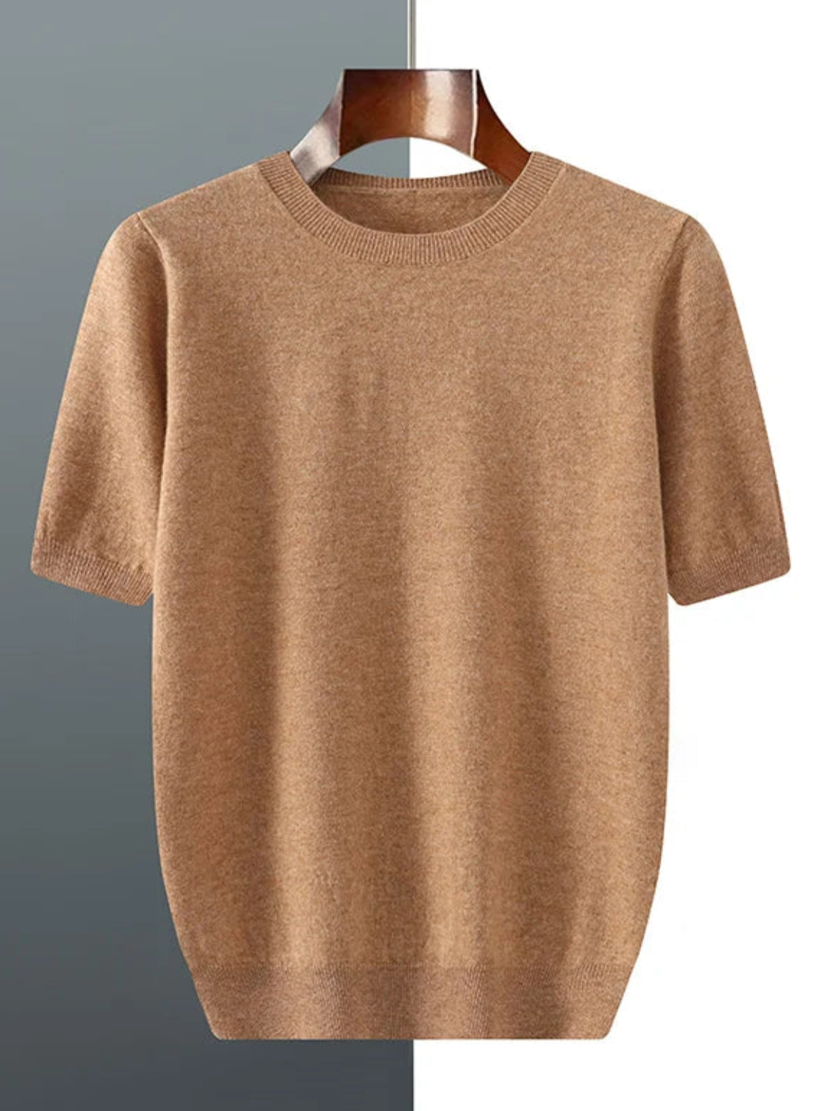 Brown t-shirt on a hanger against a gray and white background