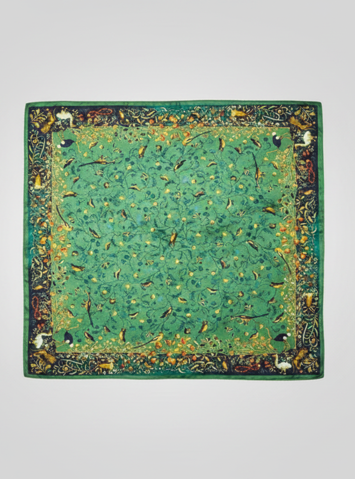 Green decorative mat with intricate patterns on a white background