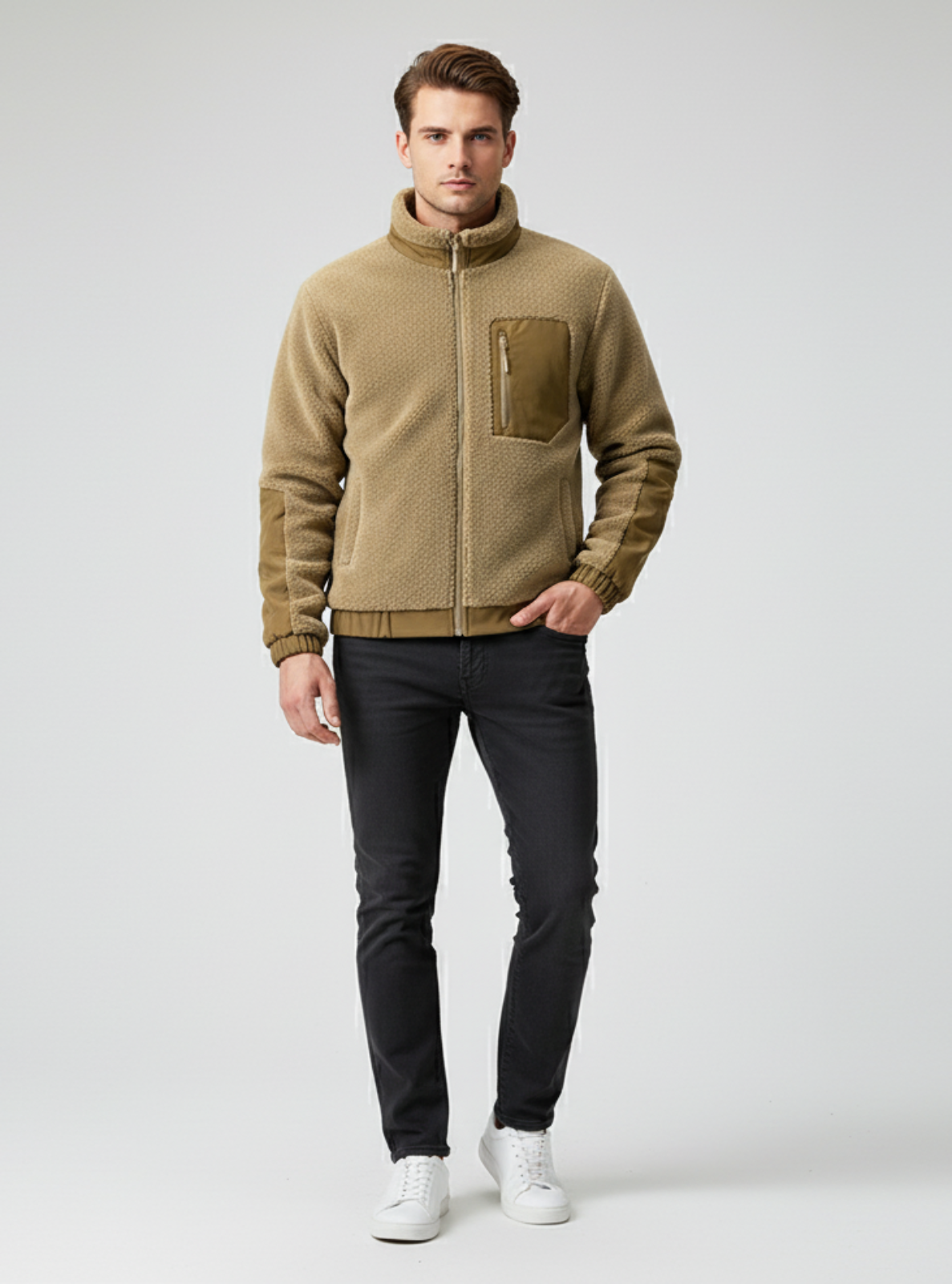 Man wearing a beige fleece jacket with a white background