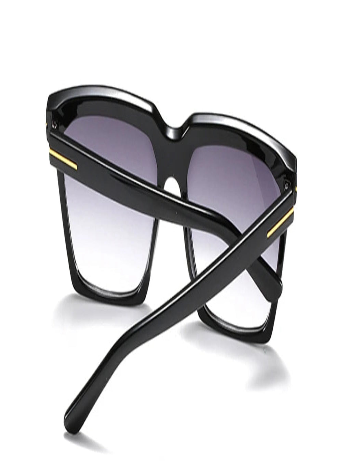 Black sunglasses with a gold accent on a white background