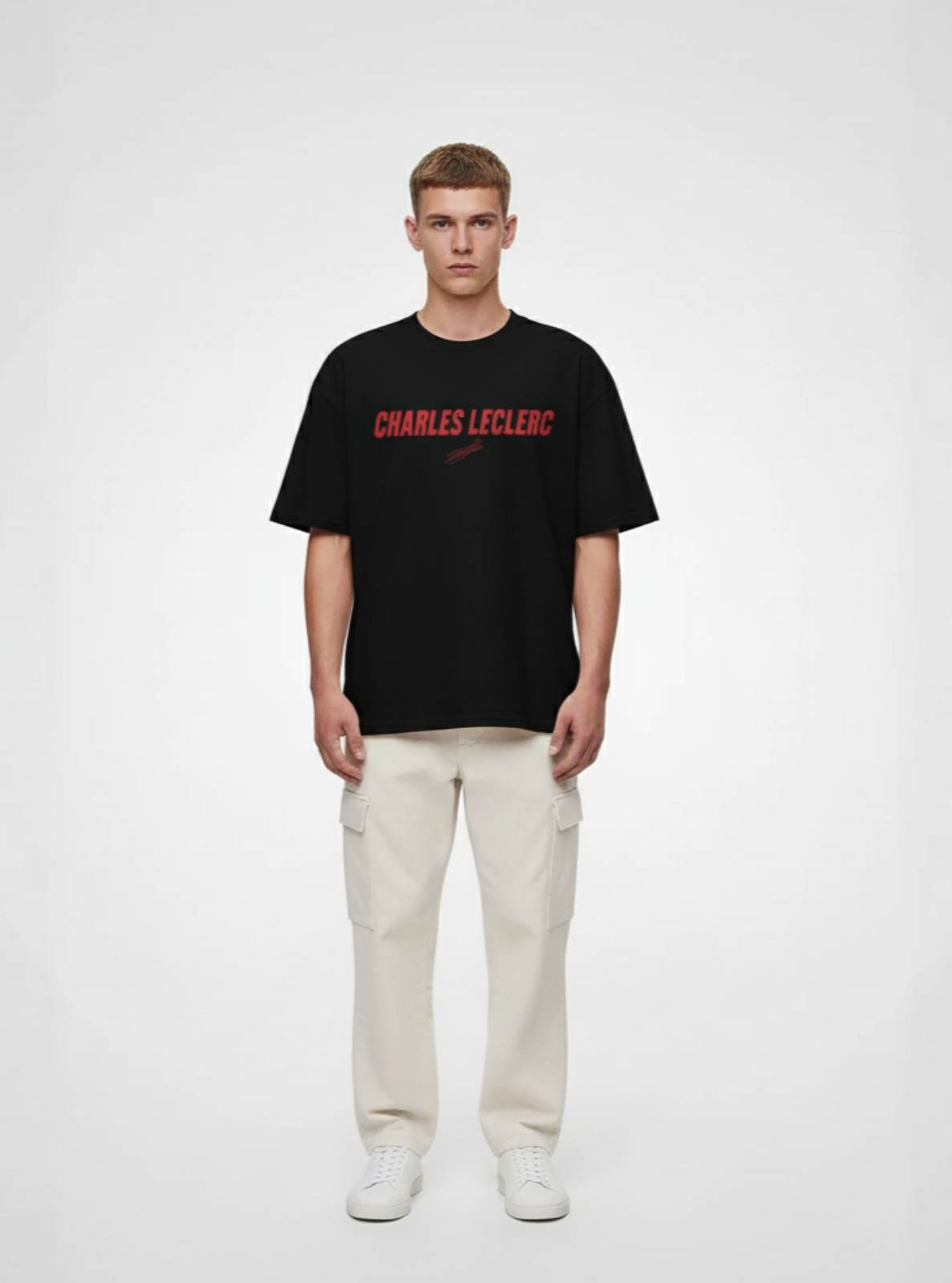 Person wearing a black t-shirt with red text on a white background