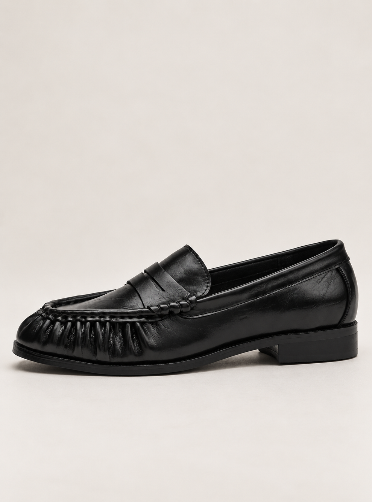 Black shoe on a white background