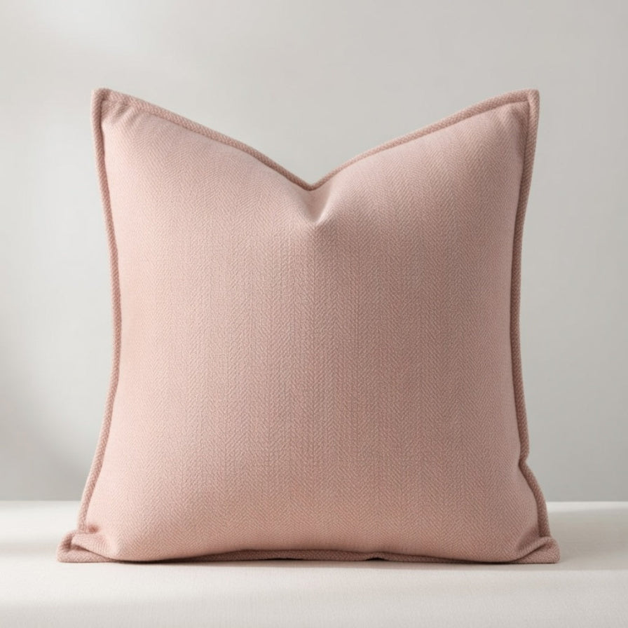 Pink pillow on a light gray background