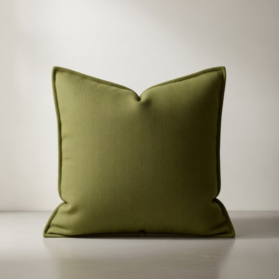 Green pillow on a neutral background
