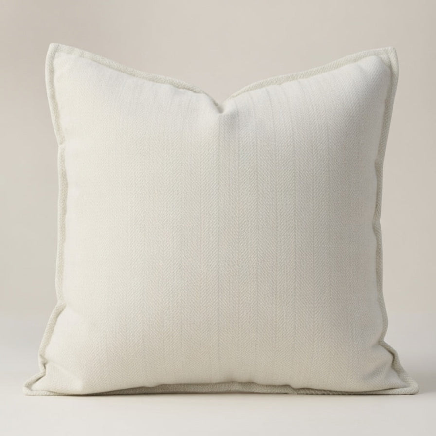 White pillow on a light gray background