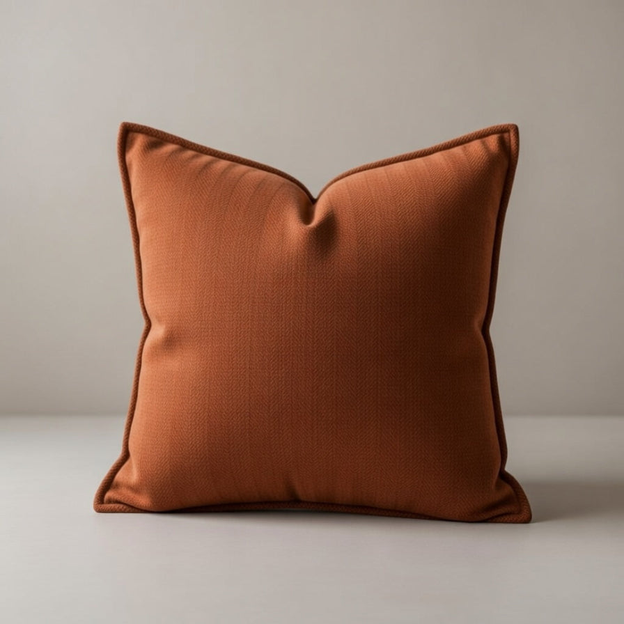 Brown pillow on a neutral background