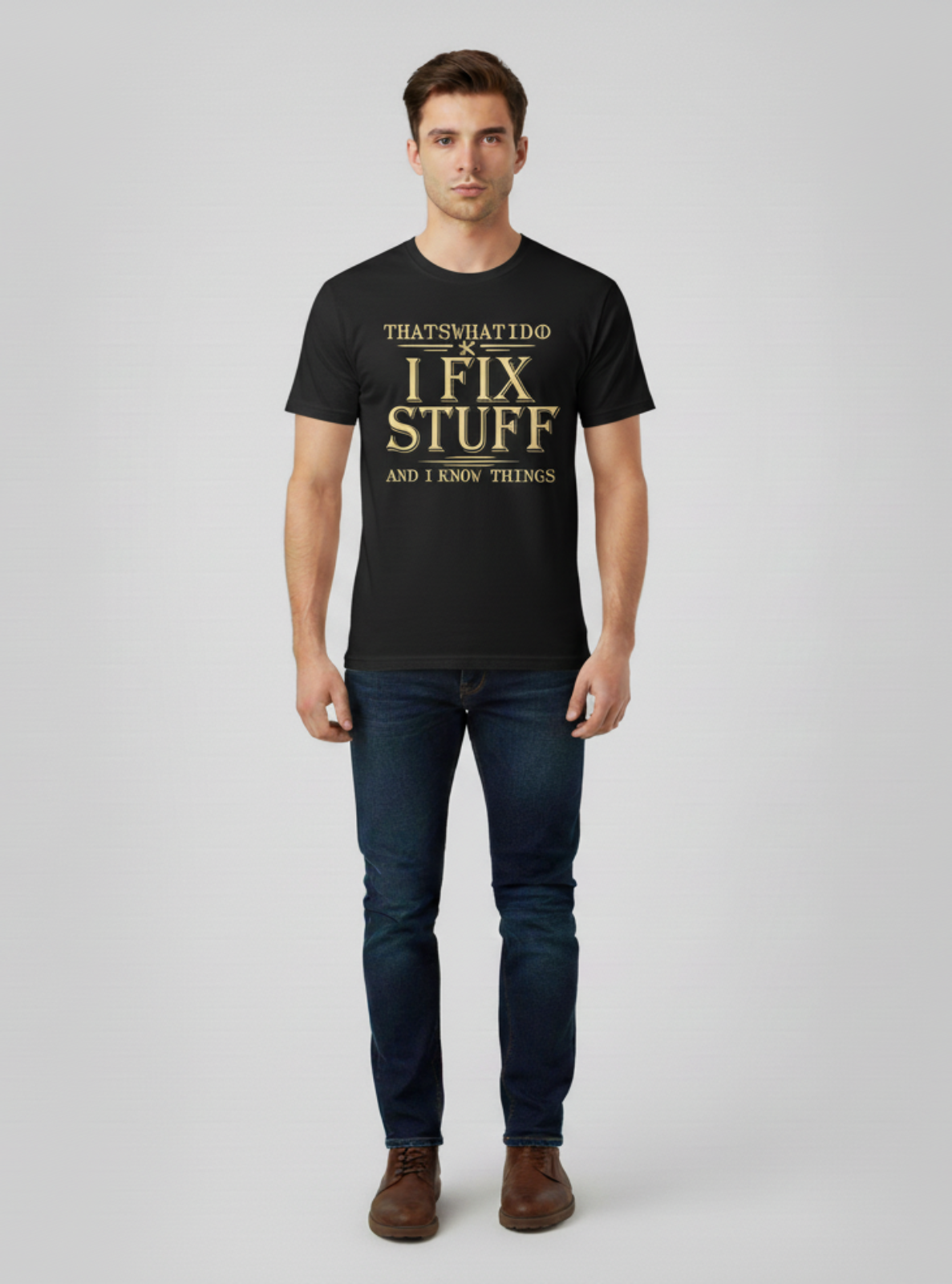 Man wearing a black t-shirt with text on a gray background