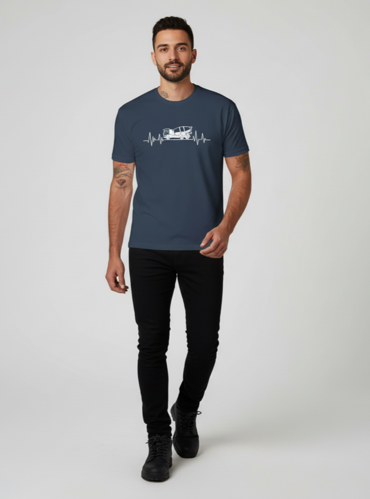Man wearing a navy blue t-shirt with a graphic design on a white background