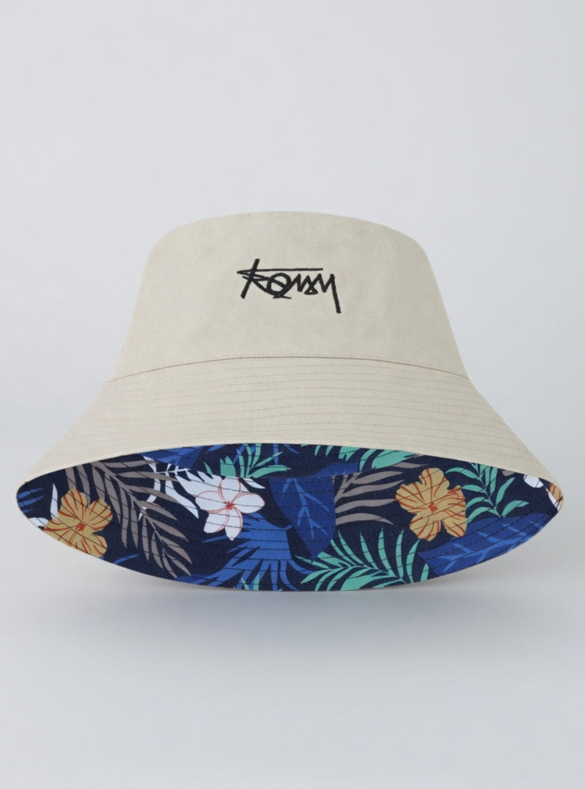 Beige bucket hat with floral pattern inside on a white background