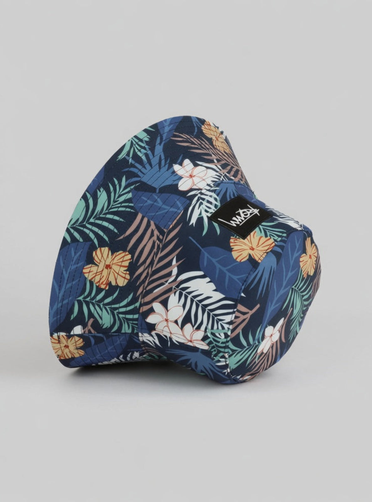 Floral-patterned head cover on a gray background