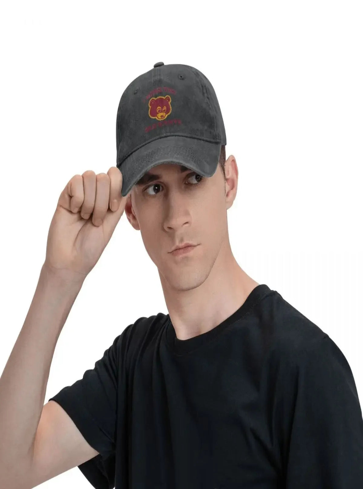 Man wearing a dark gray cap with a logo on a white background