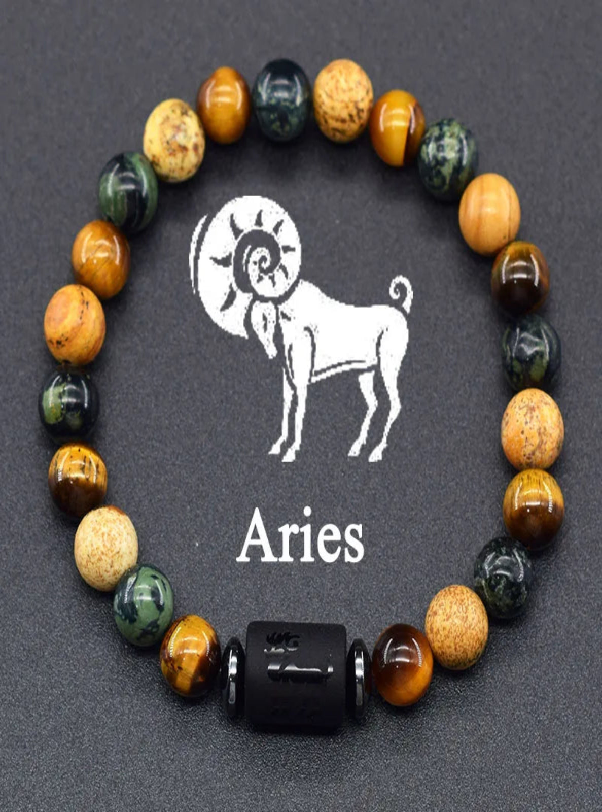 Bracelet with Aries symbol and colorful beads on a dark background