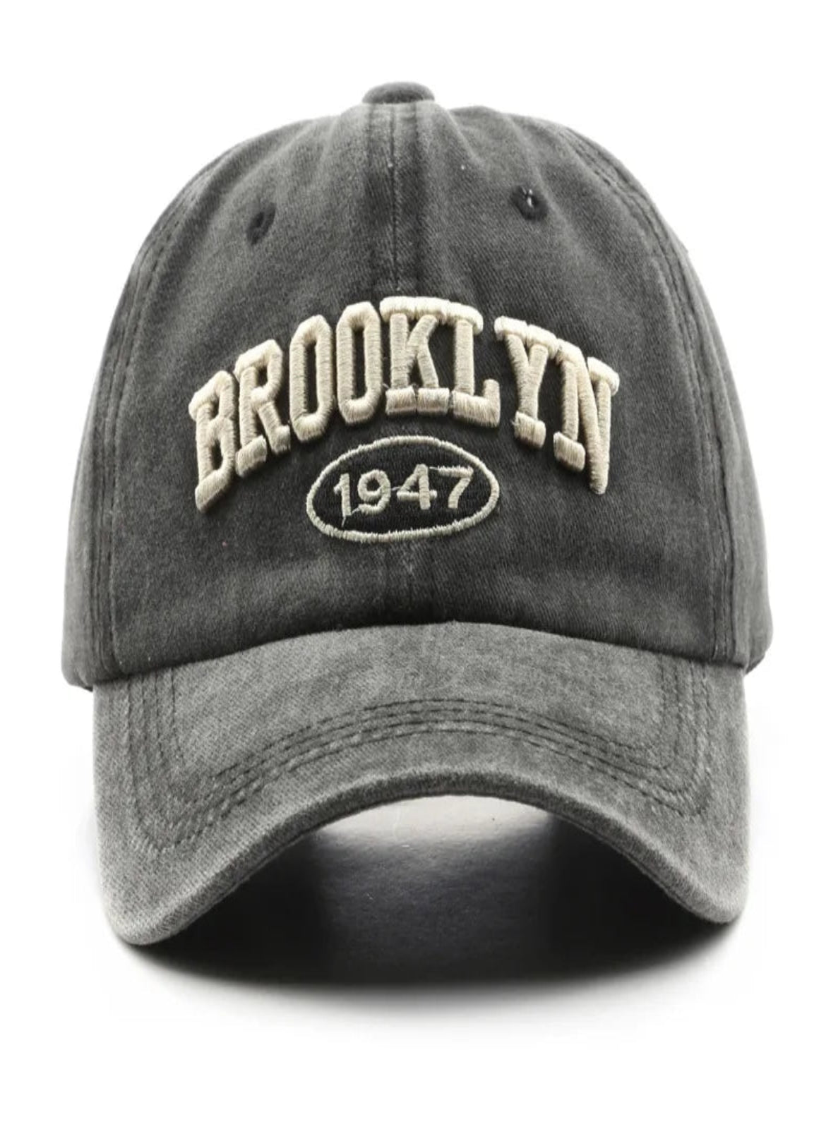 Gray cap with 'Brooklyn 1947' text on a white background