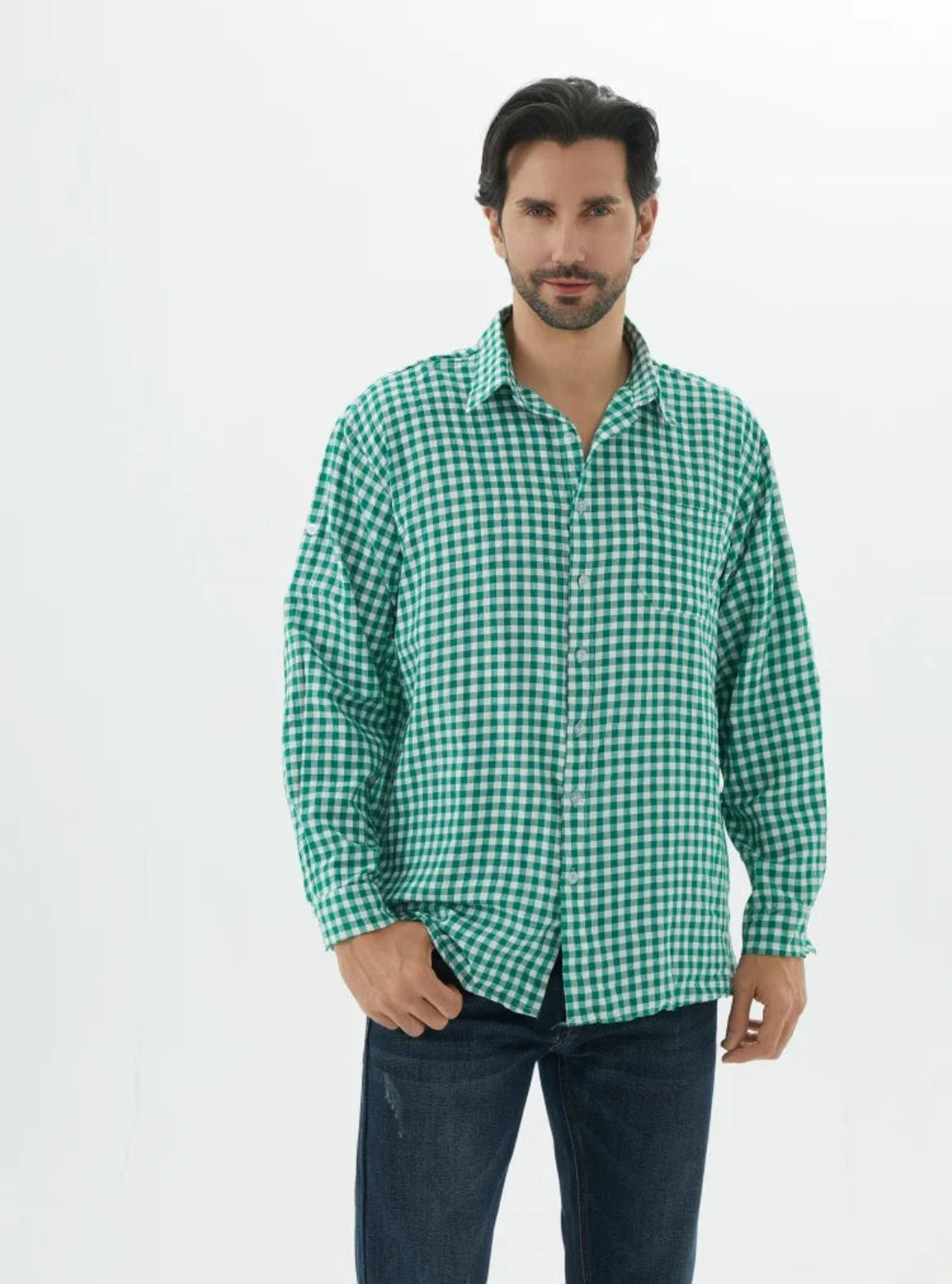 Man wearing a green checkered shirt on a white background