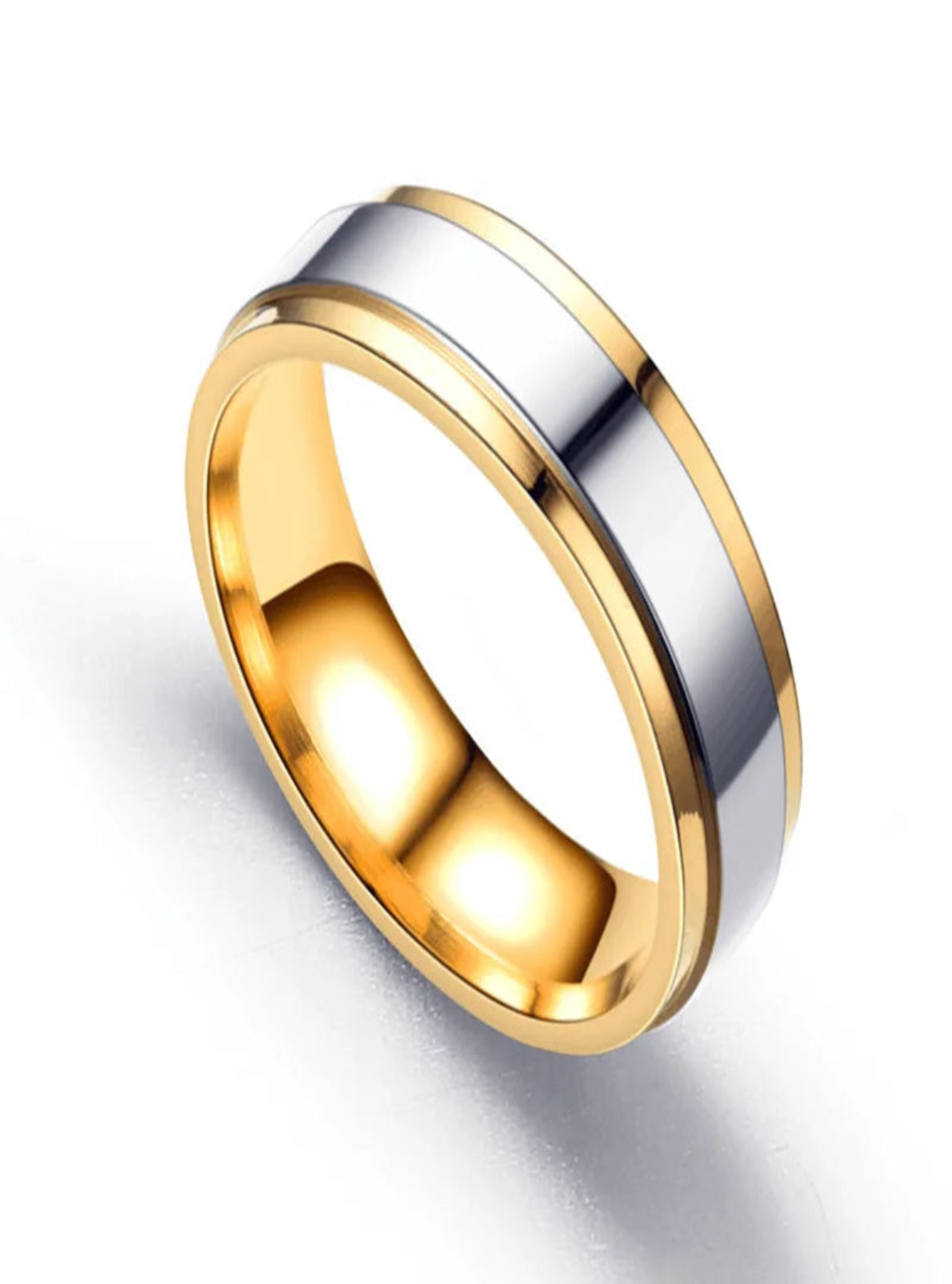 Two-tone gold and silver ring on a white background