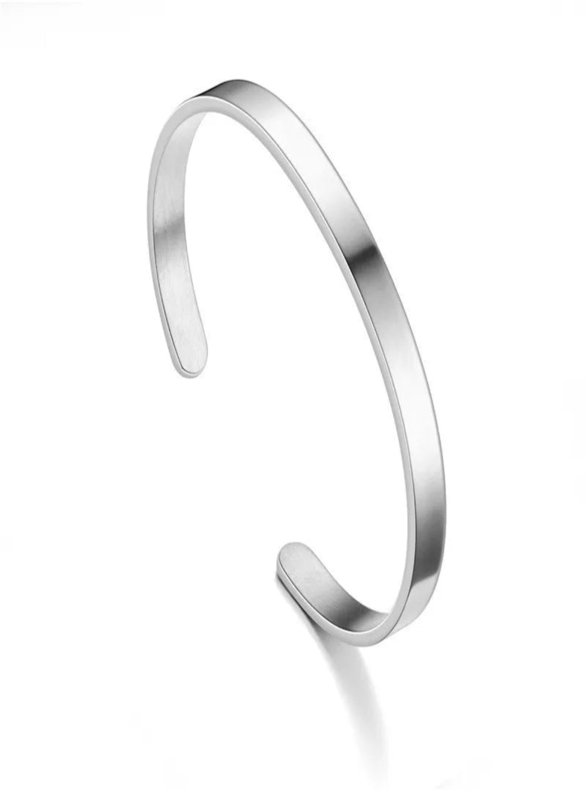 Silver open bangle on a white background
