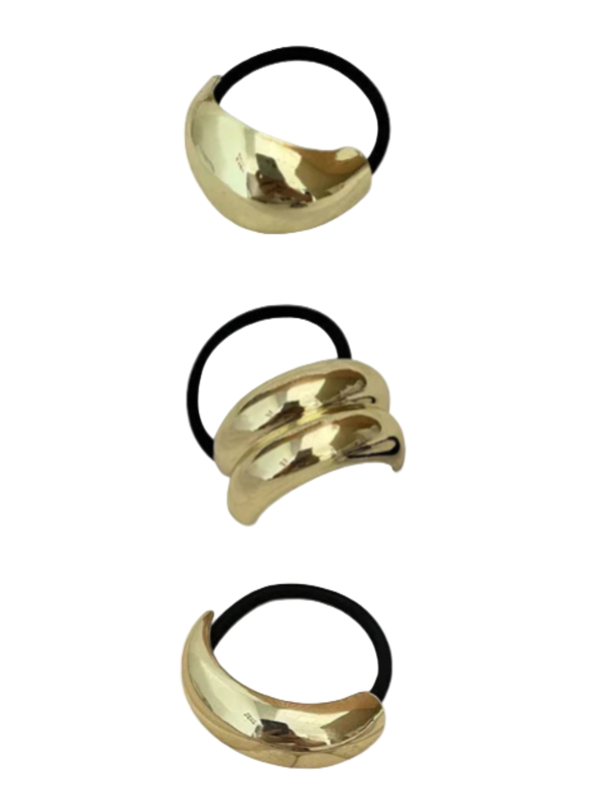 Three gold hair ties with black elastic bands on a white background