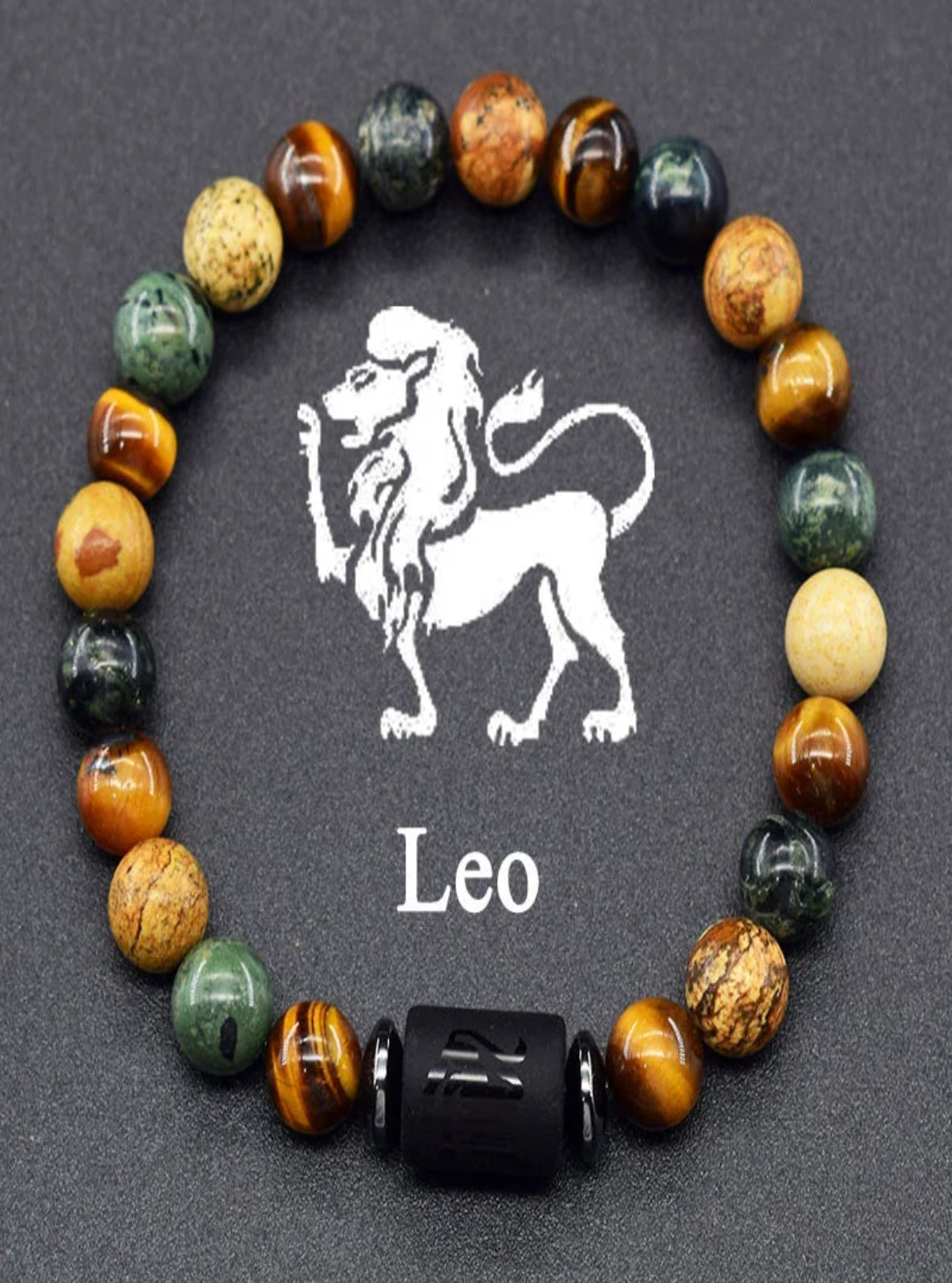 Bracelet with multicolored beads and a Leo symbol on a dark background
