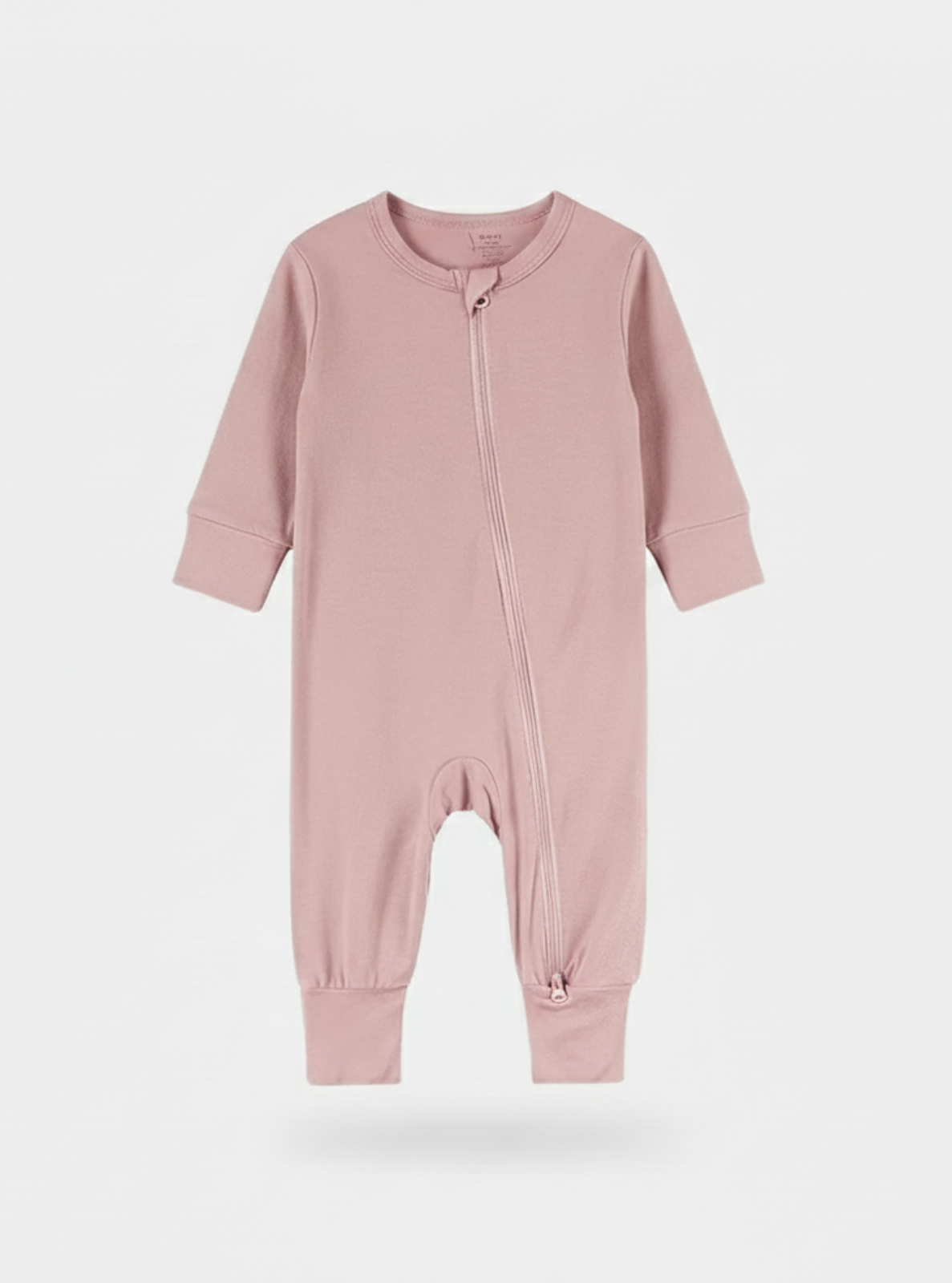 Pink baby onesie on a white background