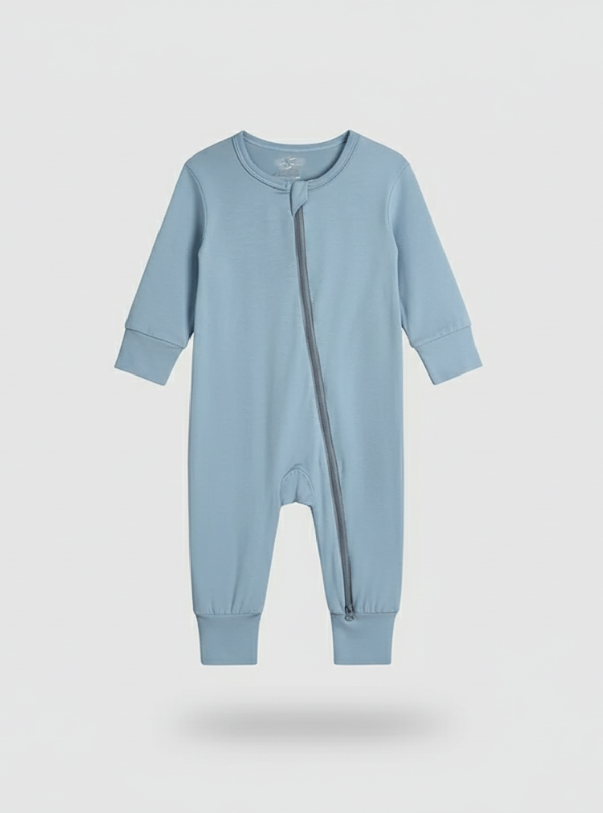 Light blue baby onesie with a zipper on a white background