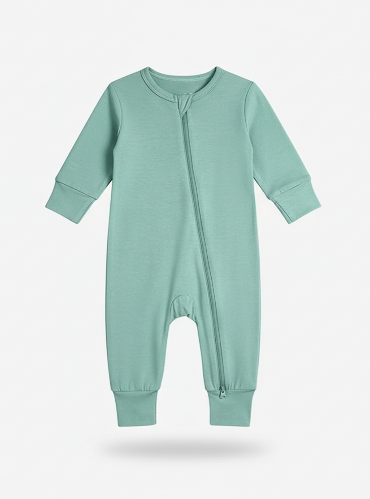Mint green baby onesie on a light gray background