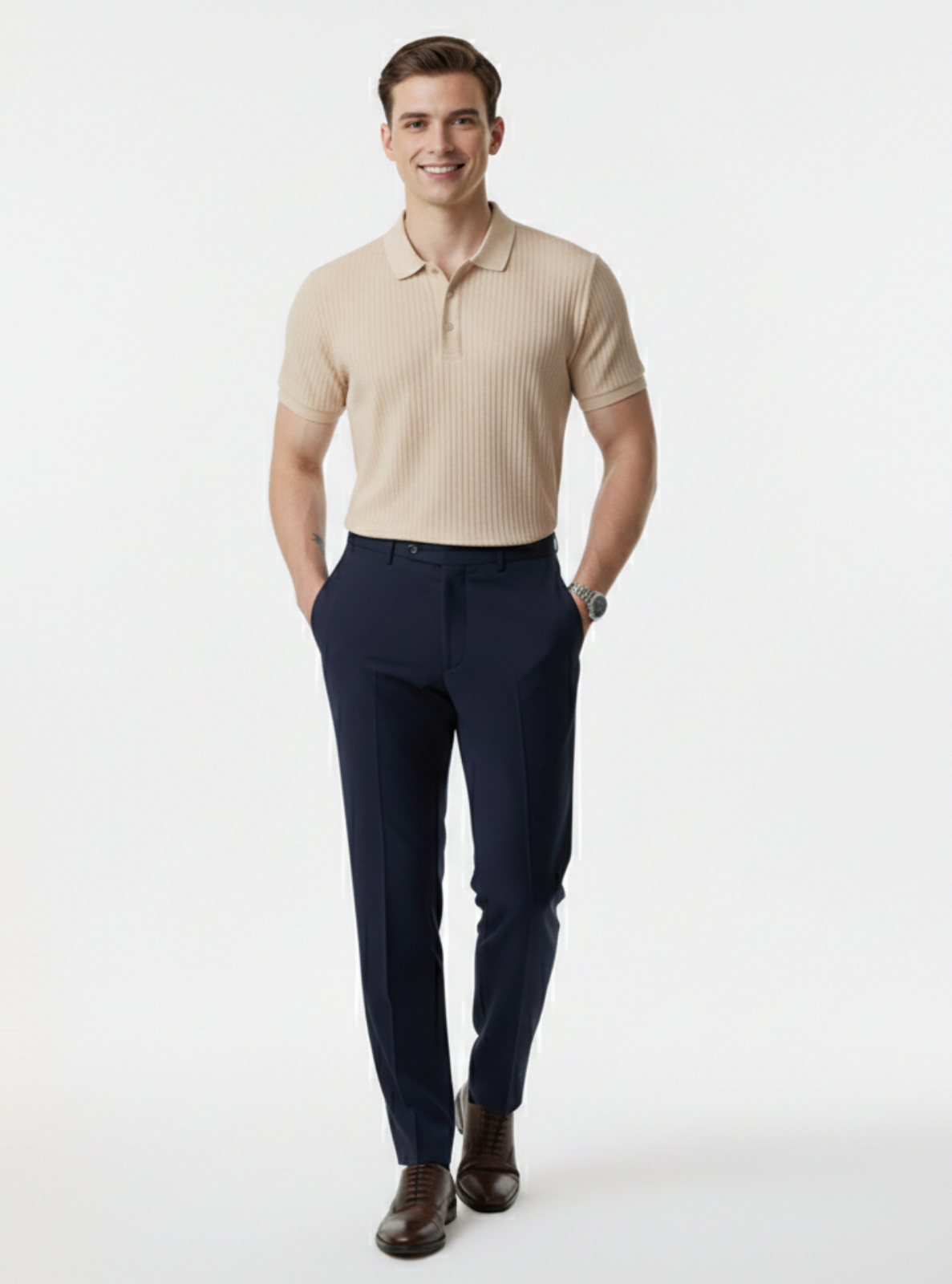 Man wearing a beige polo shirt and navy pants on a white background