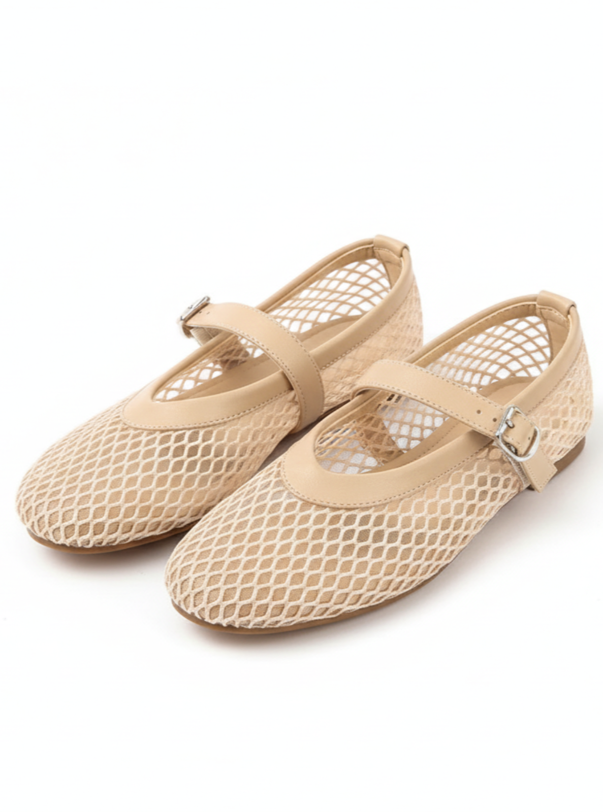 Pair of beige mesh shoes with strap on a white background