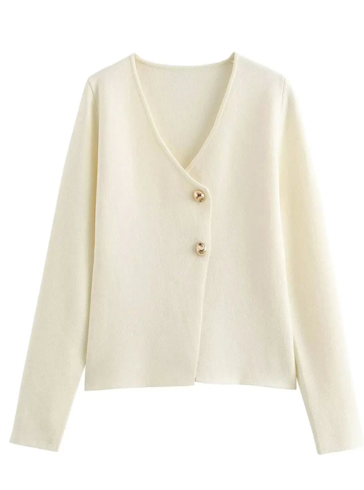 Cream-colored cardigan with buttons on a white background