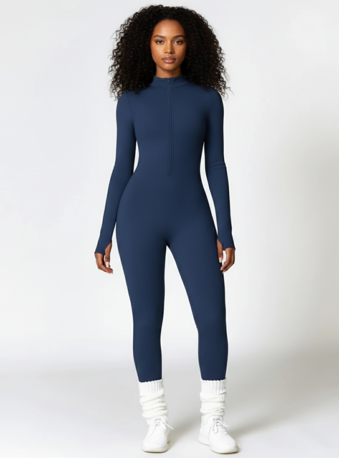 Person wearing a blue bodysuit on a white background