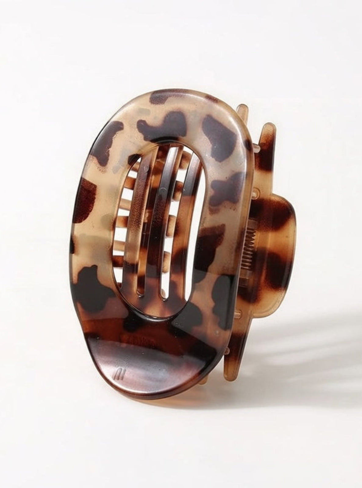 Tortoiseshell hair clip on a white background