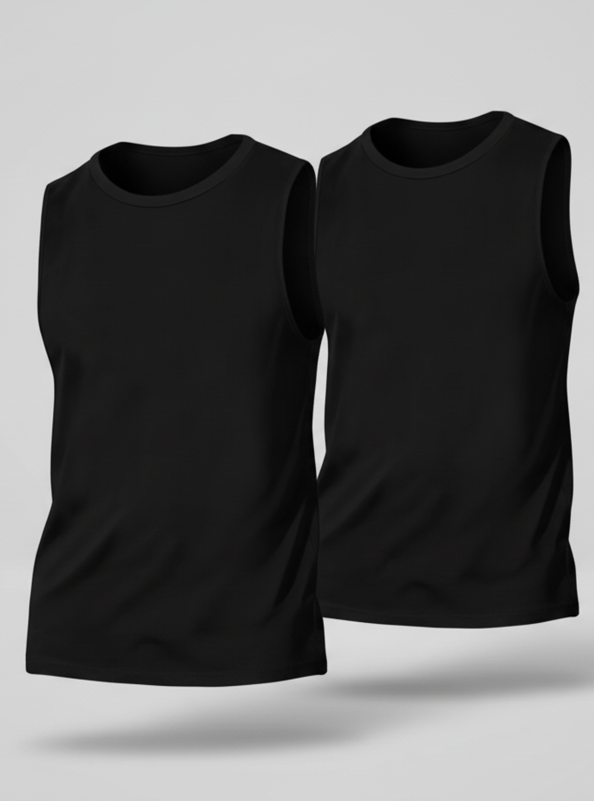 Two black sleeveless shirts on a gray background