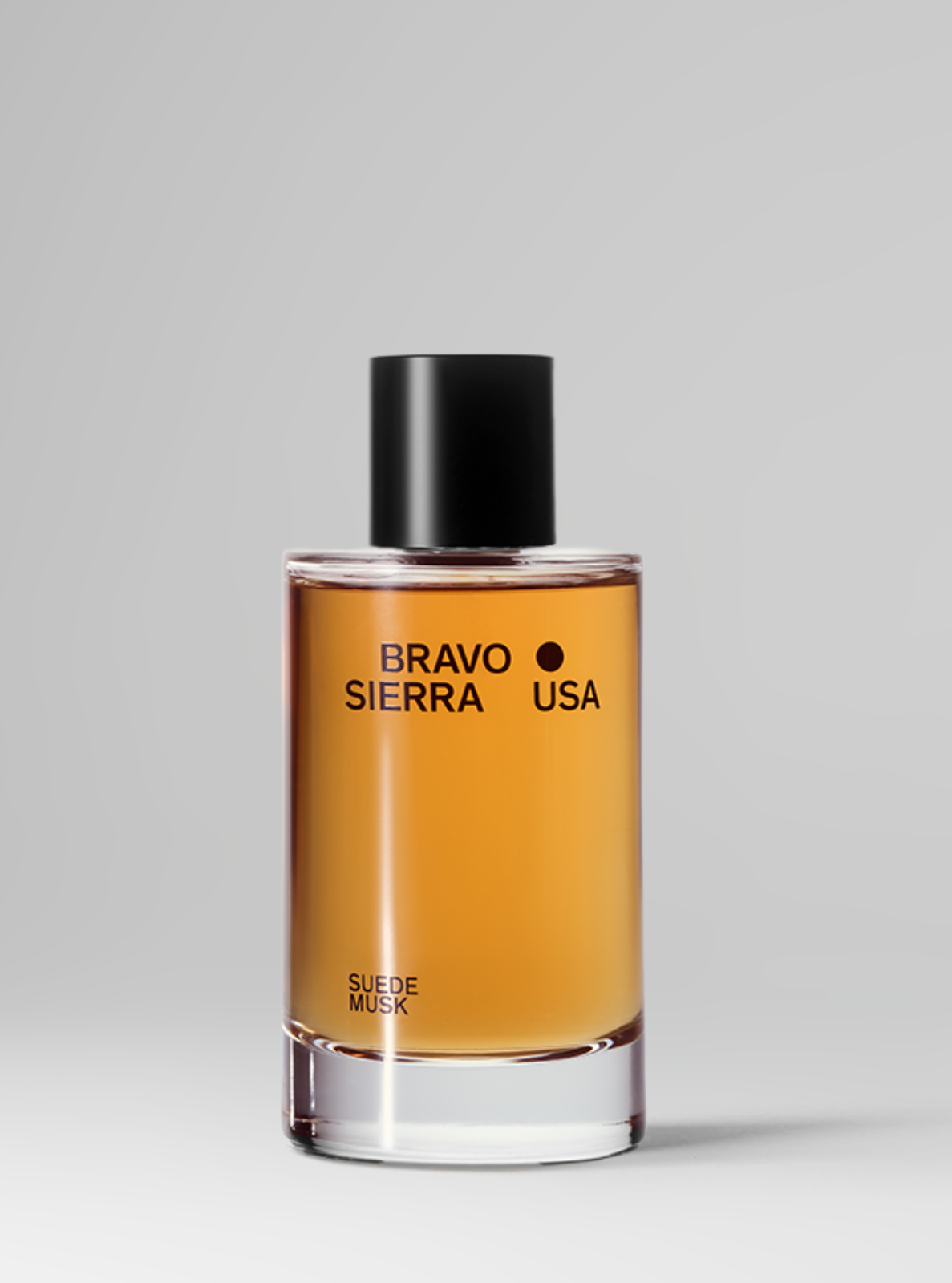 Perfume bottle labeled 'Bravo Sierra USA' on a gray background