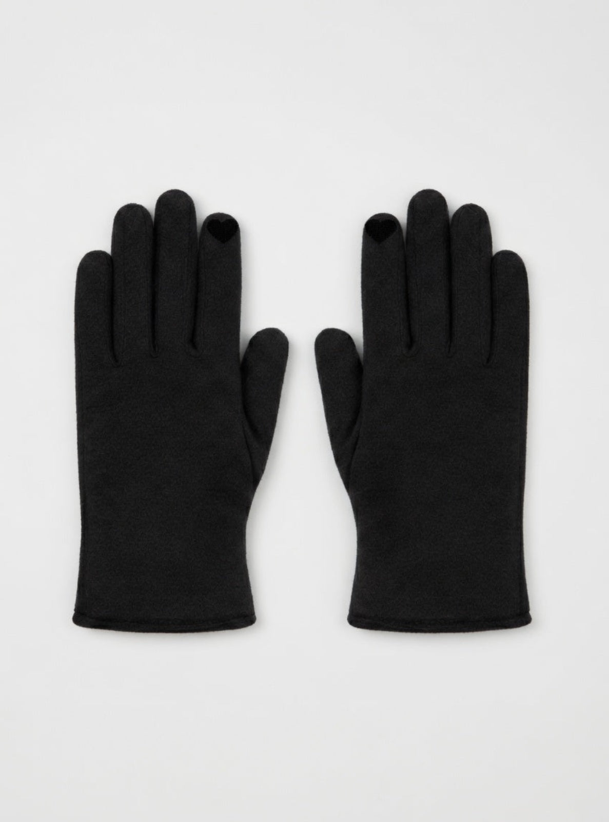 Pair of black gloves on a white background