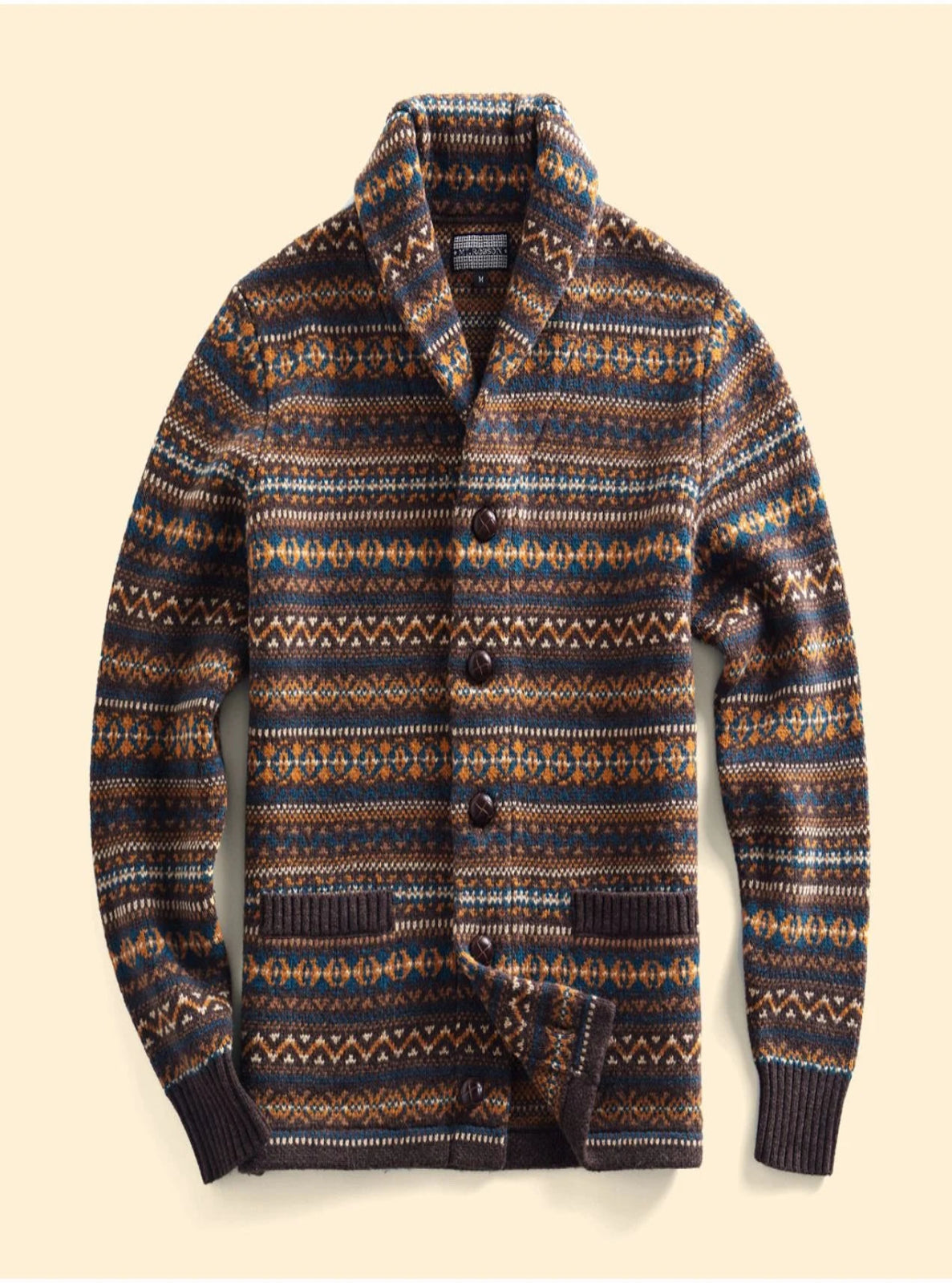 Patterned sweater on a beige background