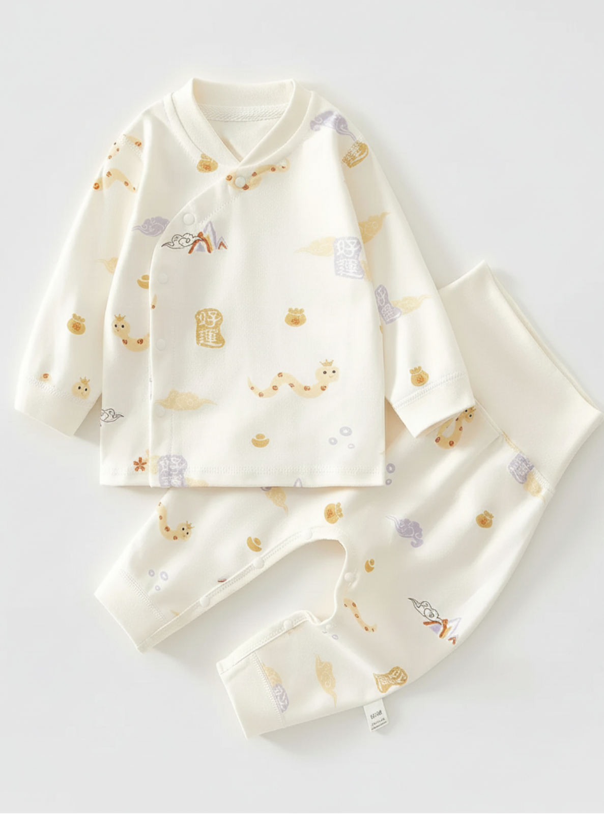 Baby outfit with long-sleeve top and pants on a white background