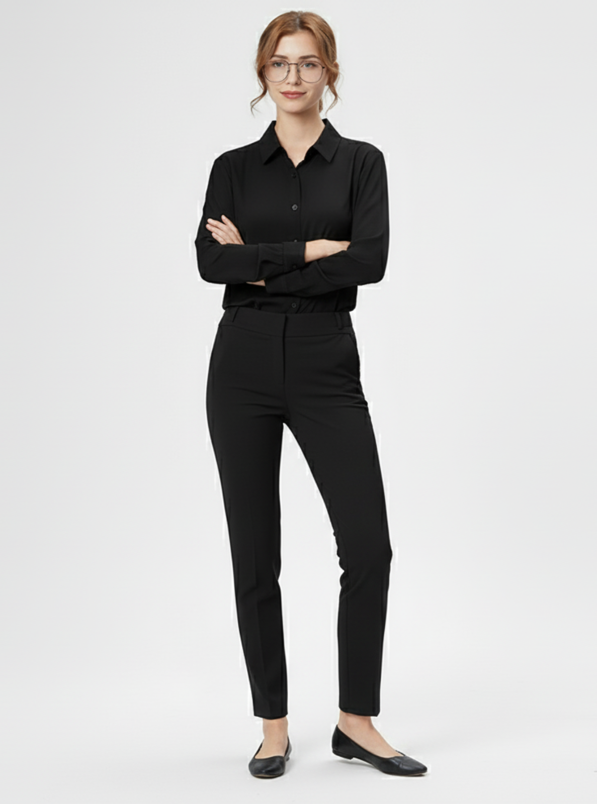 Woman wearing a black outfit on a white background