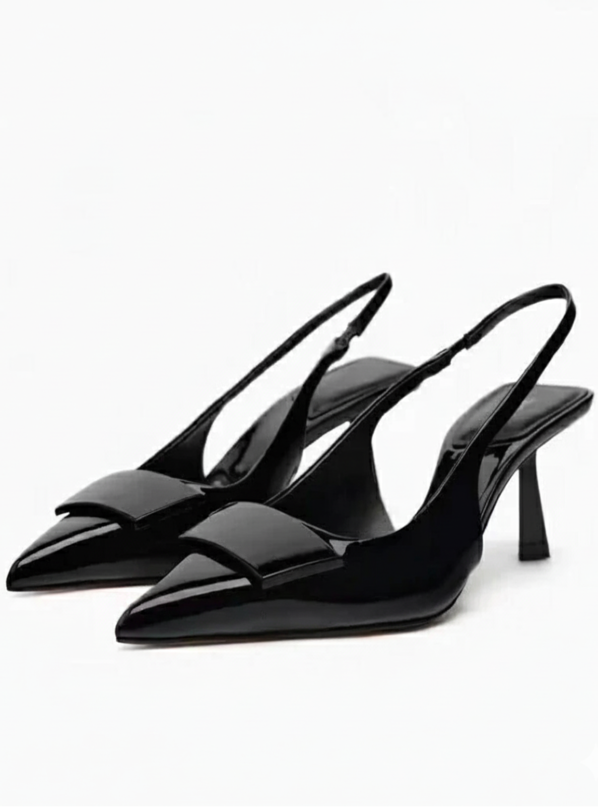 Black high-heeled shoes on a white background