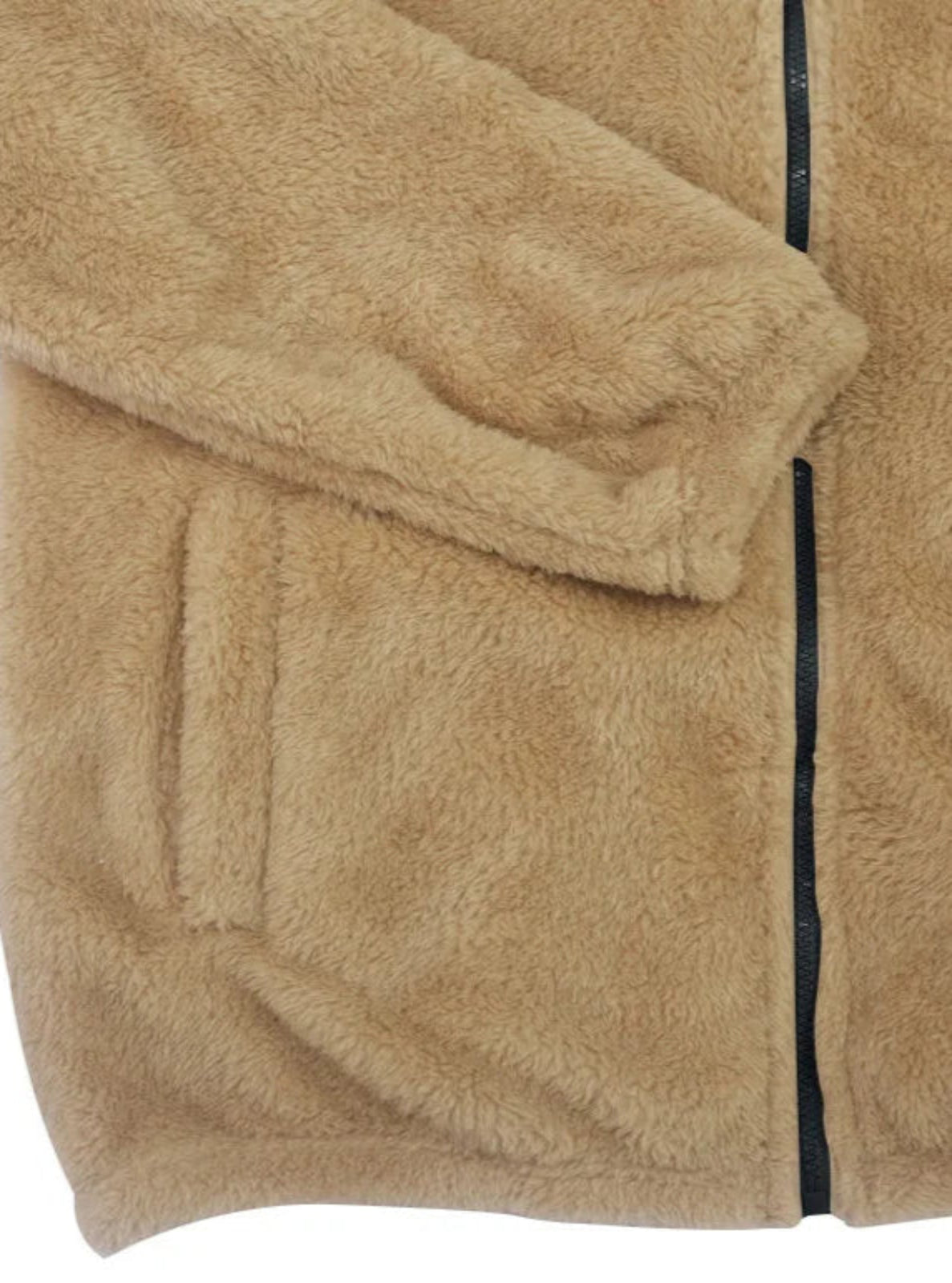 Close-up of a beige fleece jacket with a zipper on a white background