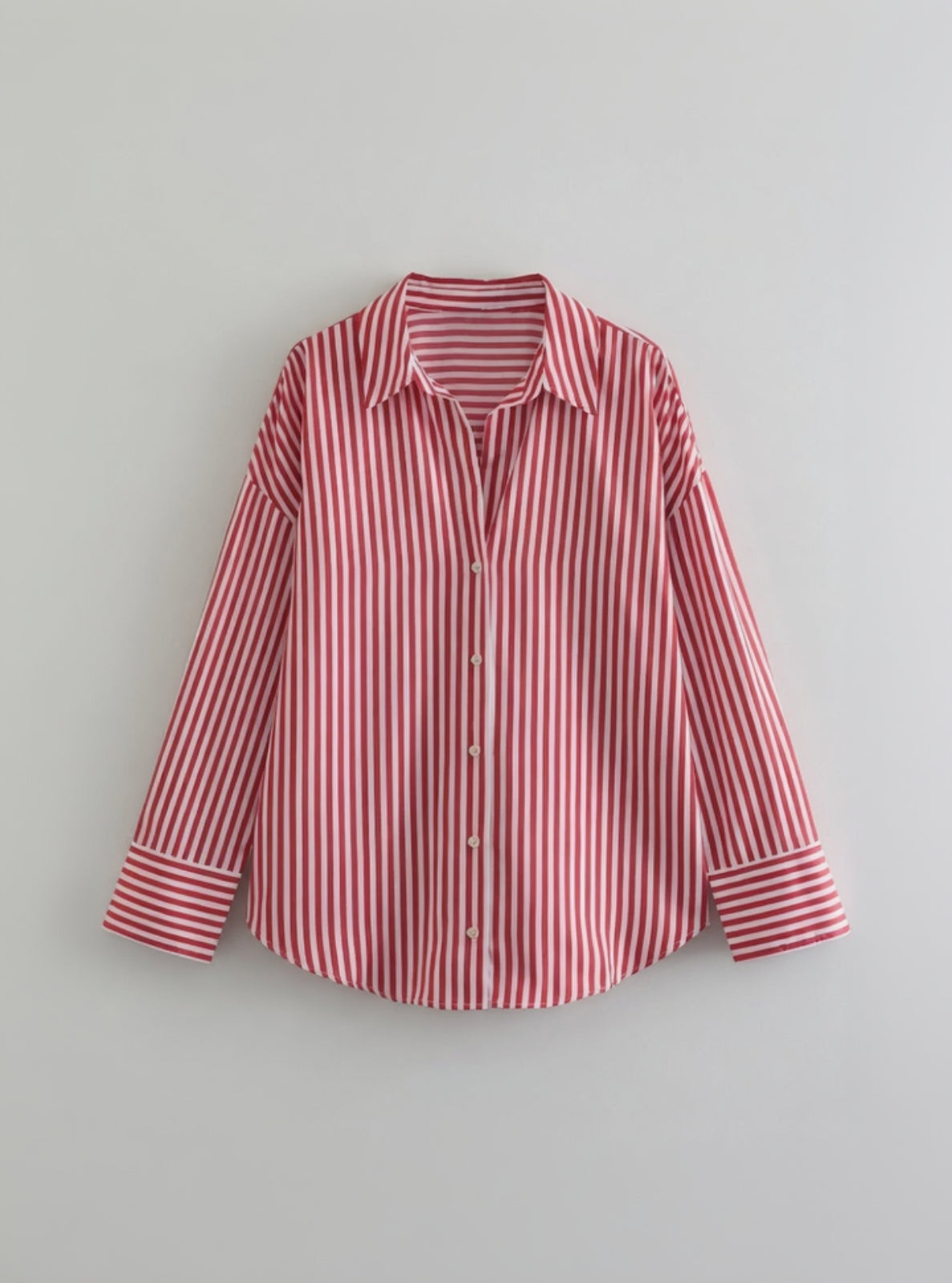 Red and white striped shirt on a light gray background