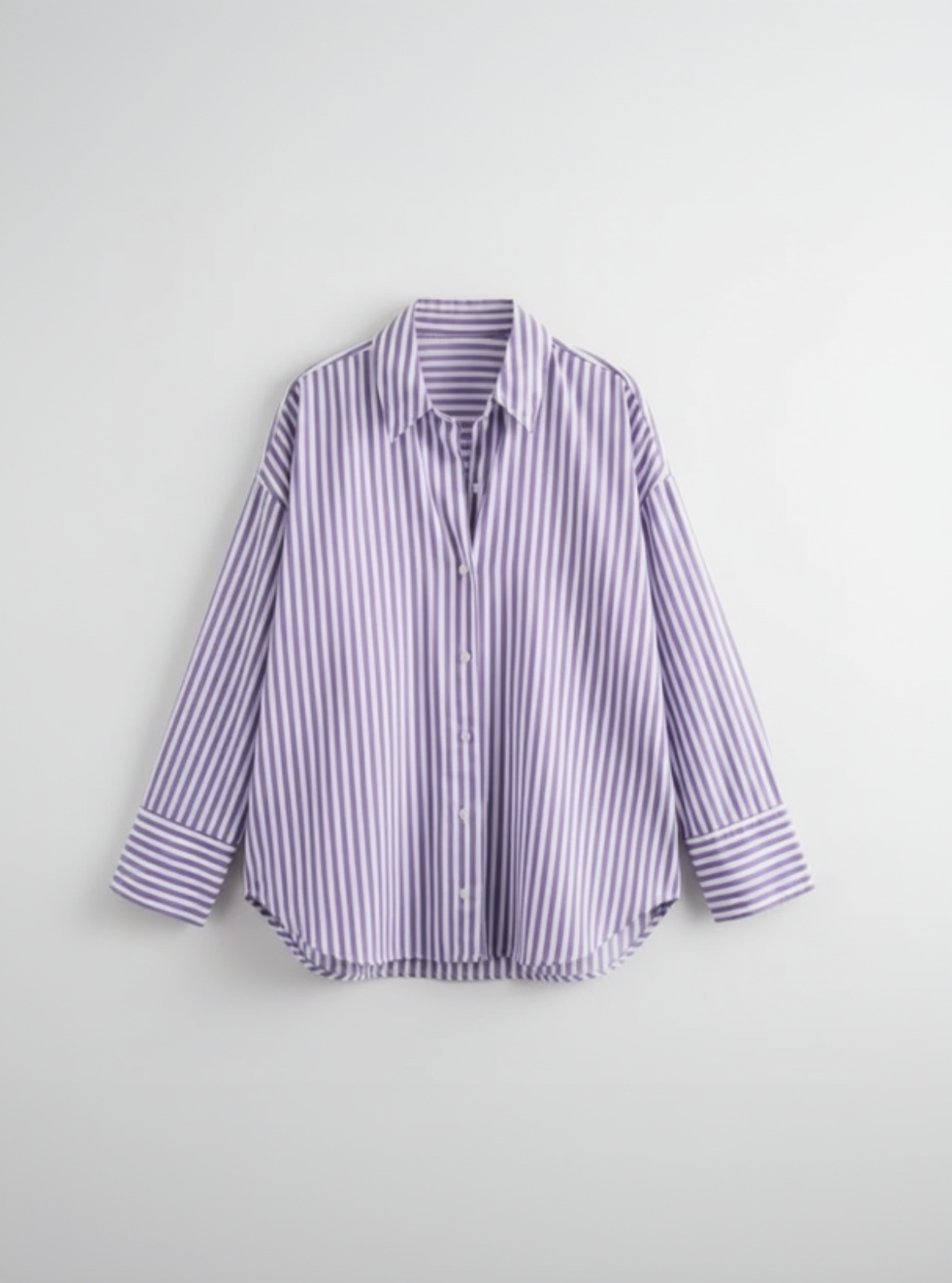 Purple and white striped shirt on a light gray background