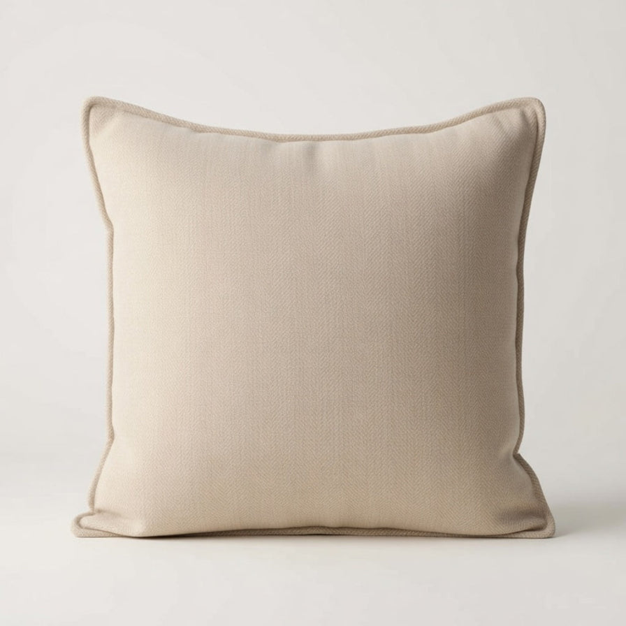 Beige pillow on a light gray background