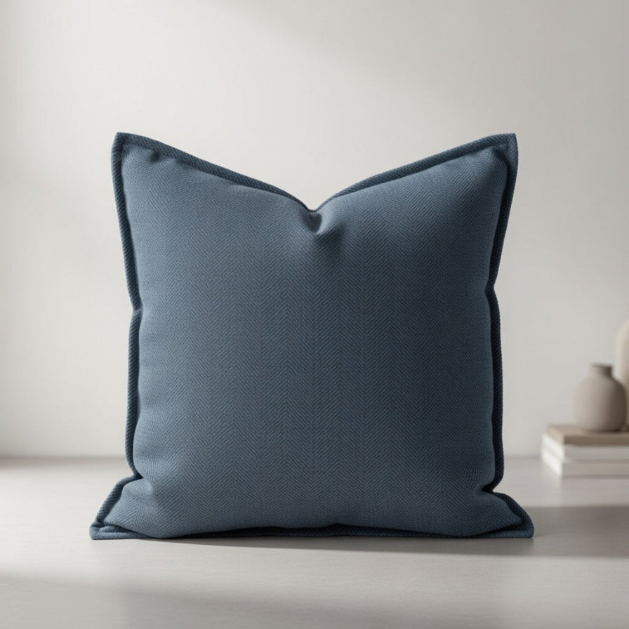 Blue pillow on a neutral background