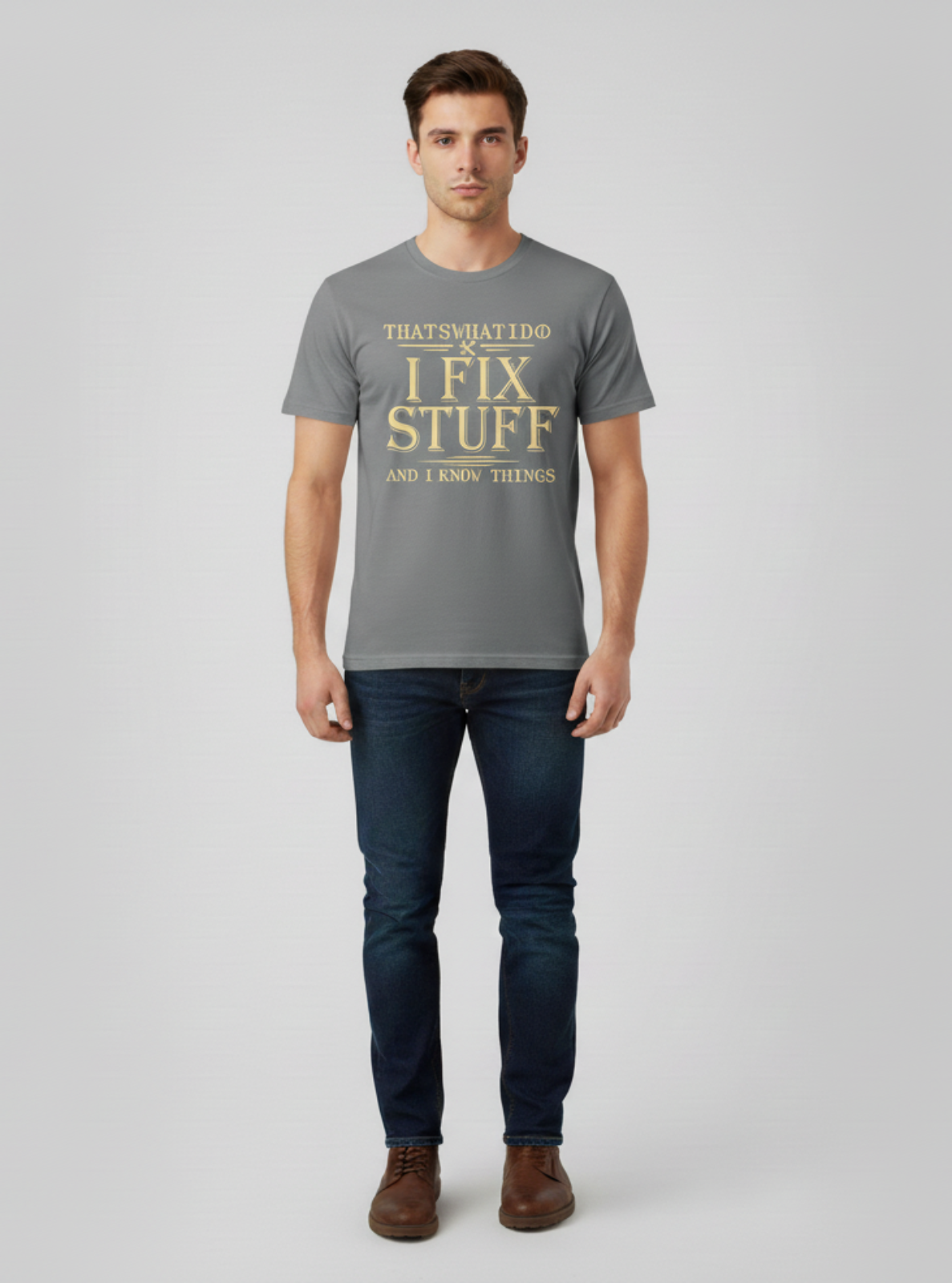 Man wearing a gray t-shirt with text on a plain background