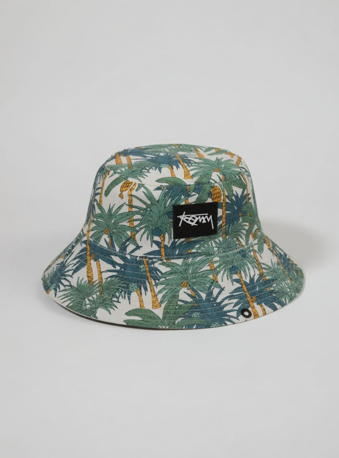 Bucket hat with palm tree pattern and Stussy logo on a light gray background