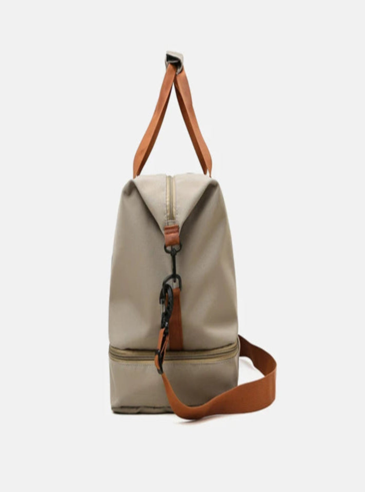 Beige crossbody bag with brown straps and black accents on a white background