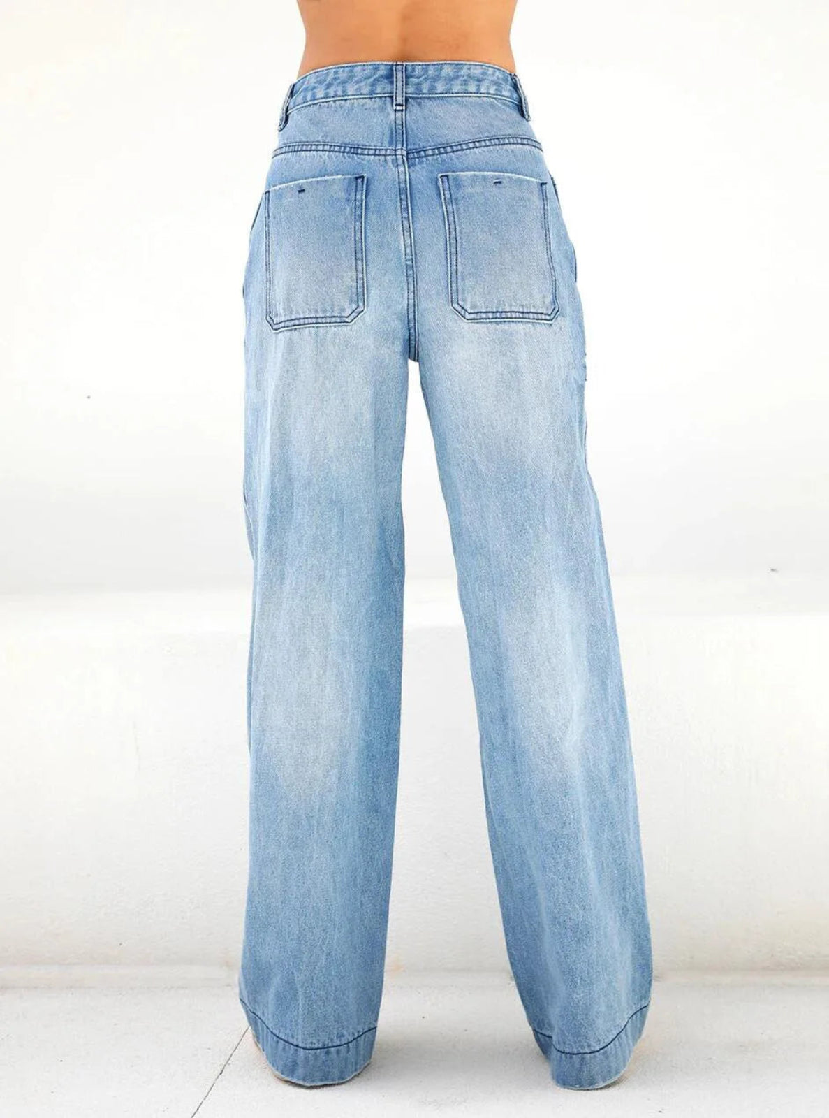 Light blue jeans on a white background