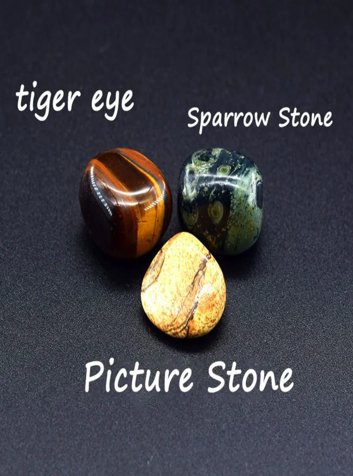 Three stones labeled 'tiger eye', 'Sparrow Stone', and 'Picture Stone' on a dark background.