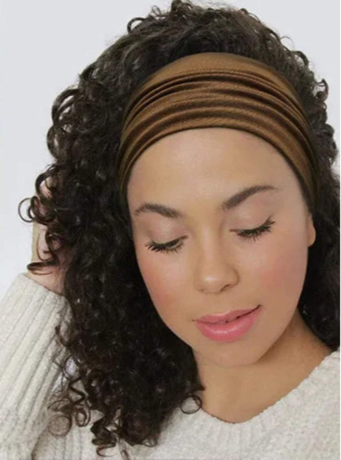 woman wearing brown headband 